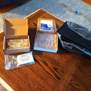 Lot of containers for samples and 5x7 padded mailers.